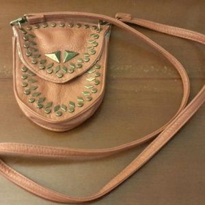 Free People mini crossbody concert bag.